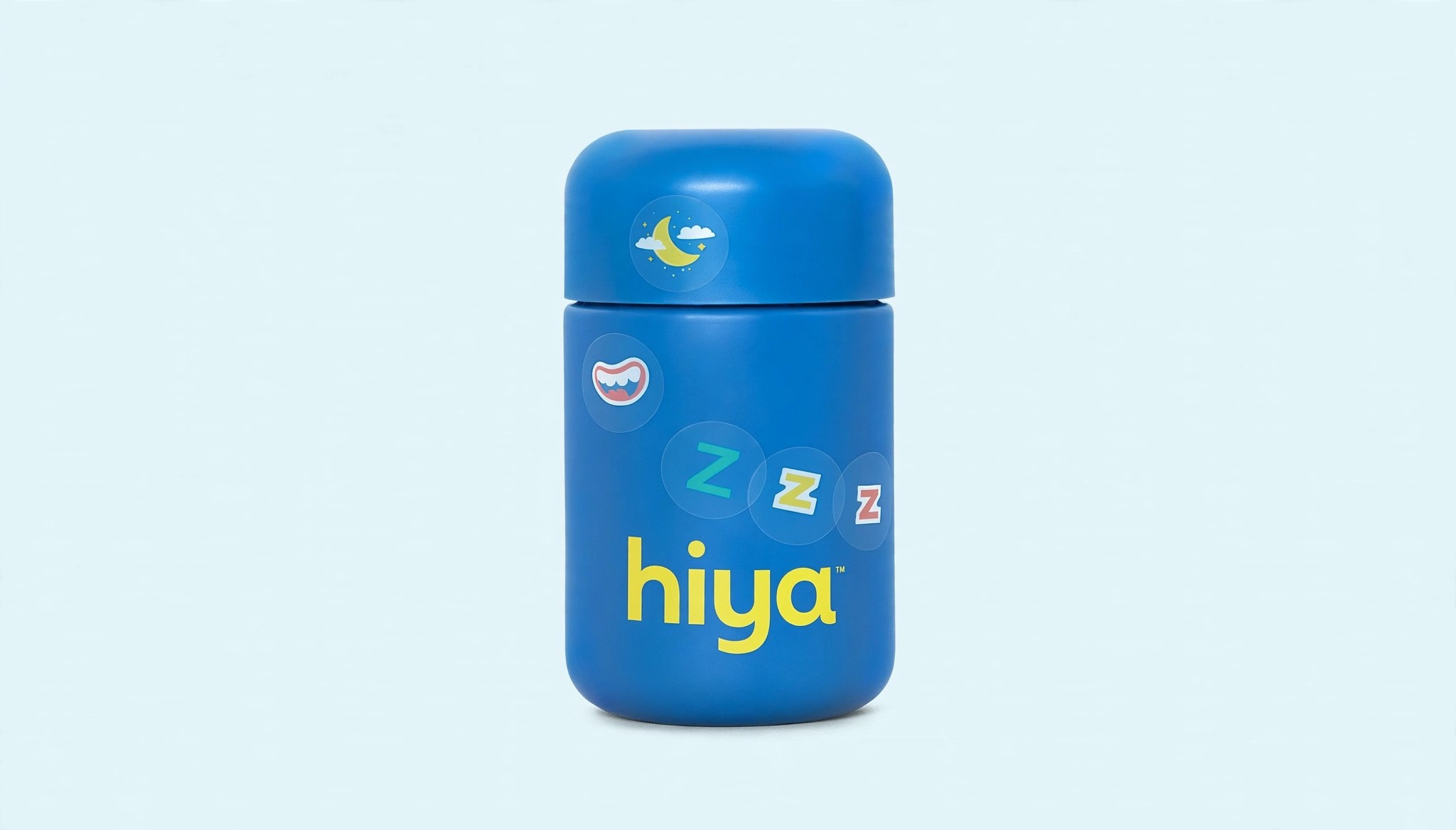 A blue refillable Hiya bottle with stickers on light background.