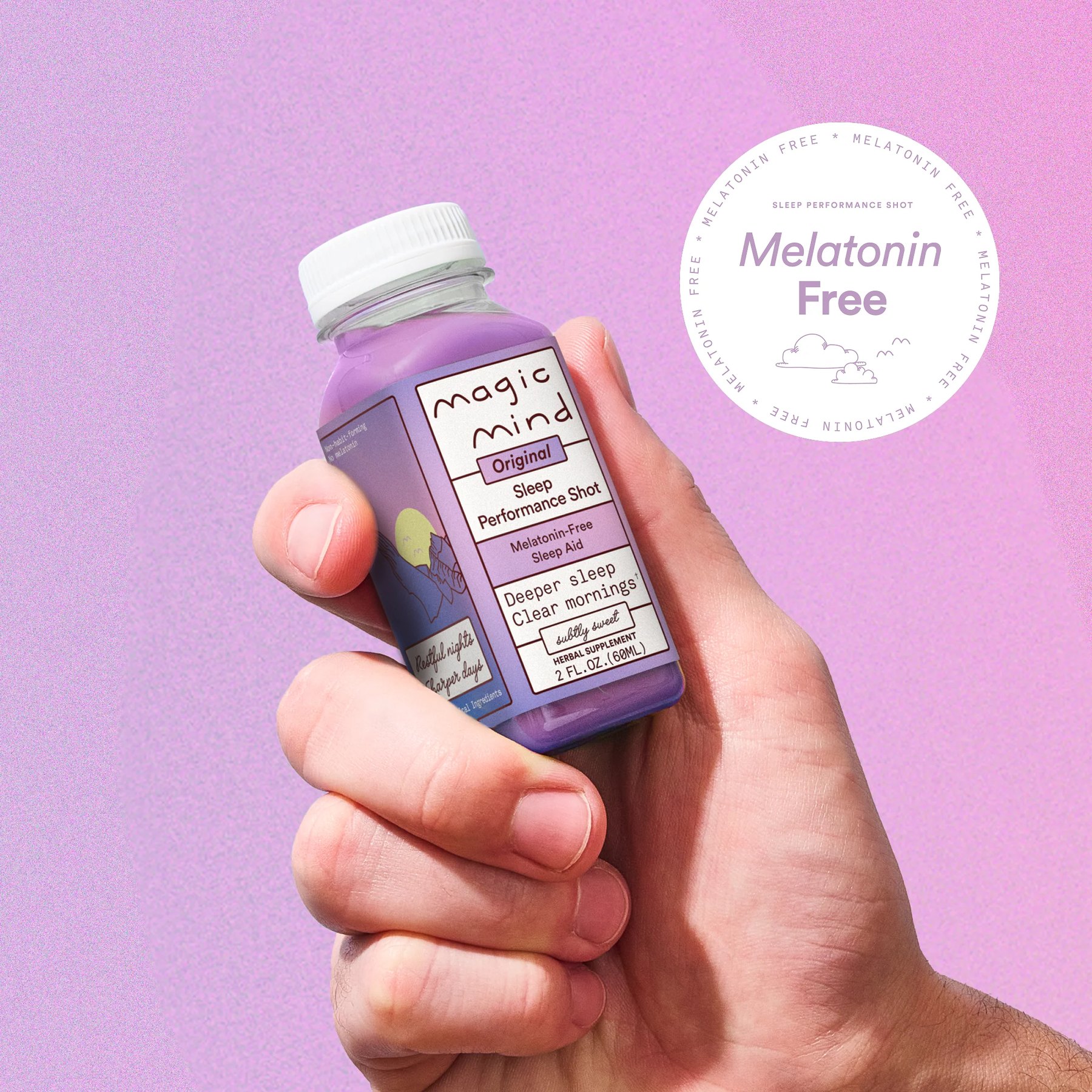 A hand holds a Magic Mind Sleep shot bottle.